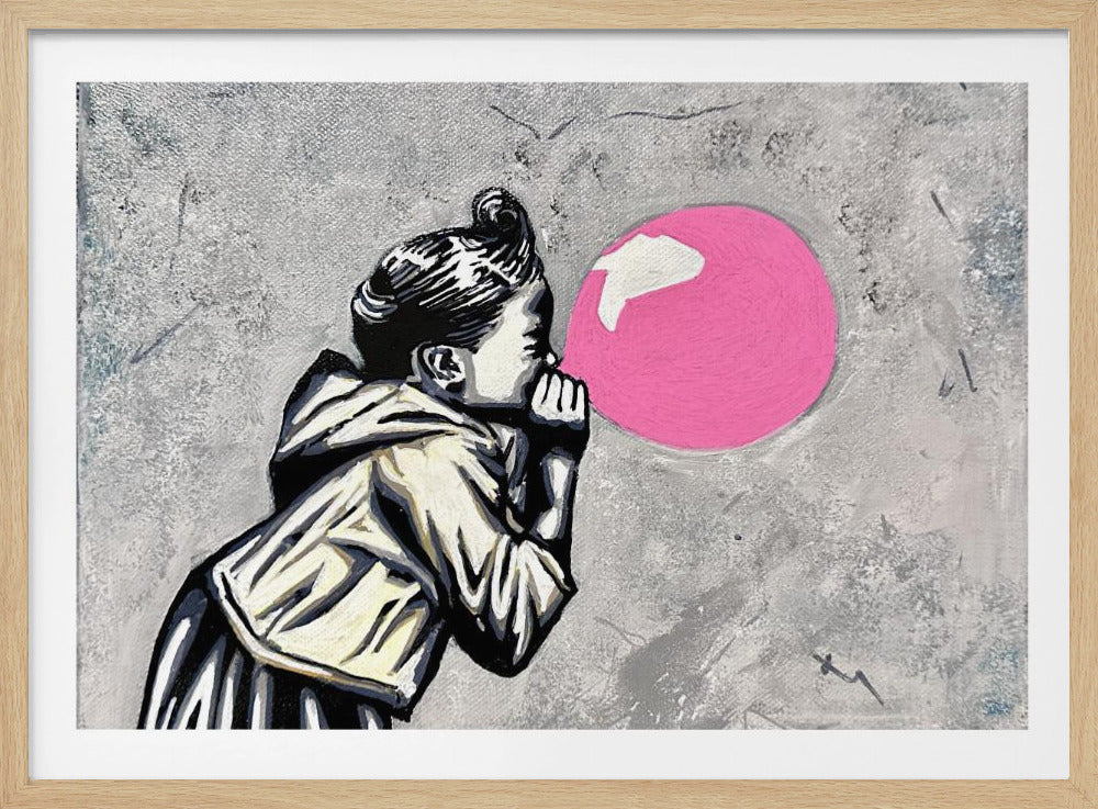 A street art style painting of a girl in profile, rendered in black and white, blowing a large, vibrant pink bubblegum bubble against a textured grey background. The artwork is enclosed in a silver frame. Wall Art