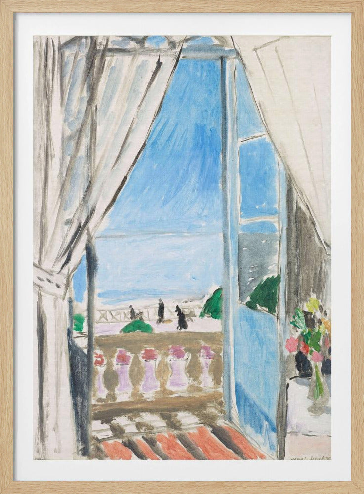 A Fauvist-style painting by Henri Matisse of a view from a window. The scene looks out from behind white curtains, over a balcony with a terracotta floor, to a bright blue sea and sky. Silhouettes of people walk along a promenade in the distance. To the right, a small vase of colorful flowers sits on a table. Decor