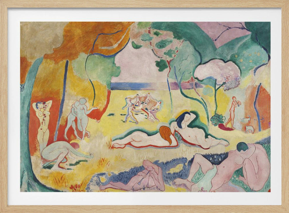 A framed print of Henri Matisse's Fauvist painting, 'Le bonheur de vivre' (The Joy of Life). It shows a vibrant, colorful landscape with numerous nude figures relaxing, dancing, and playing music. The scene uses unnaturalistic colors like yellow earth, orange and green trees, and a pink sky to evoke a sense of idyllic joy. Decor