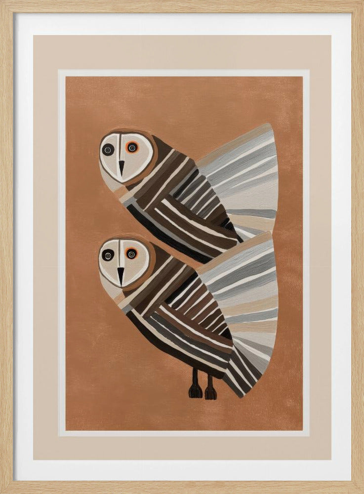 A framed modern art print of two stylized barn owls against a warm brown background. The owls are decorated with geometric stripes in shades of brown, beige, grey, and black, and have large, captivating eyes. Wall Art