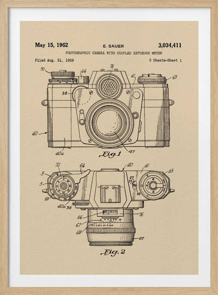 A framed vintage patent illustration from 1962 for a photographic camera with an exposure meter, showing detailed front and top-down technical drawings in black ink on aged beige paper. Decor