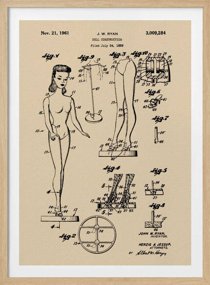 A framed vintage patent print for a 'Doll Construction' from 1961, showing detailed schematic drawings of a female doll resembling the original Barbie. The print is on beige paper with black ink and has a black frame. Wall Art