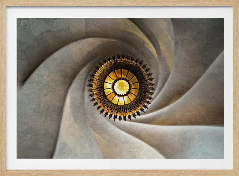 A low-angle, centered photograph looking up at an ornate, golden sunburst chandelier hanging from the vortex of a swirling, textured cream-colored ceiling, enclosed in a silver frame. Poster