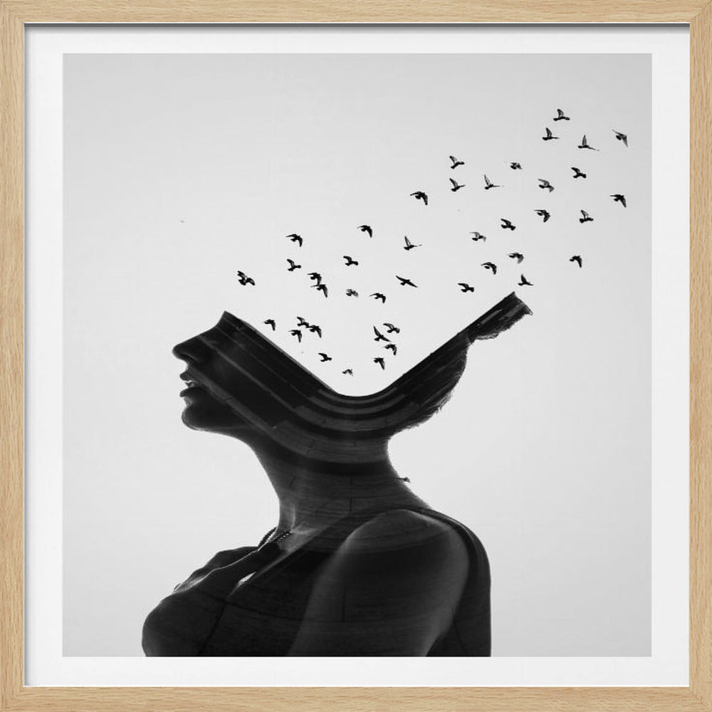 A surreal black and white framed artwork showing a woman's silhouette in profile. The top of her head is open, and a flock of birds is flying out and upwards against a white background, symbolizing thoughts or freedom. Her form has a double exposure effect with dark, curved lines. Print