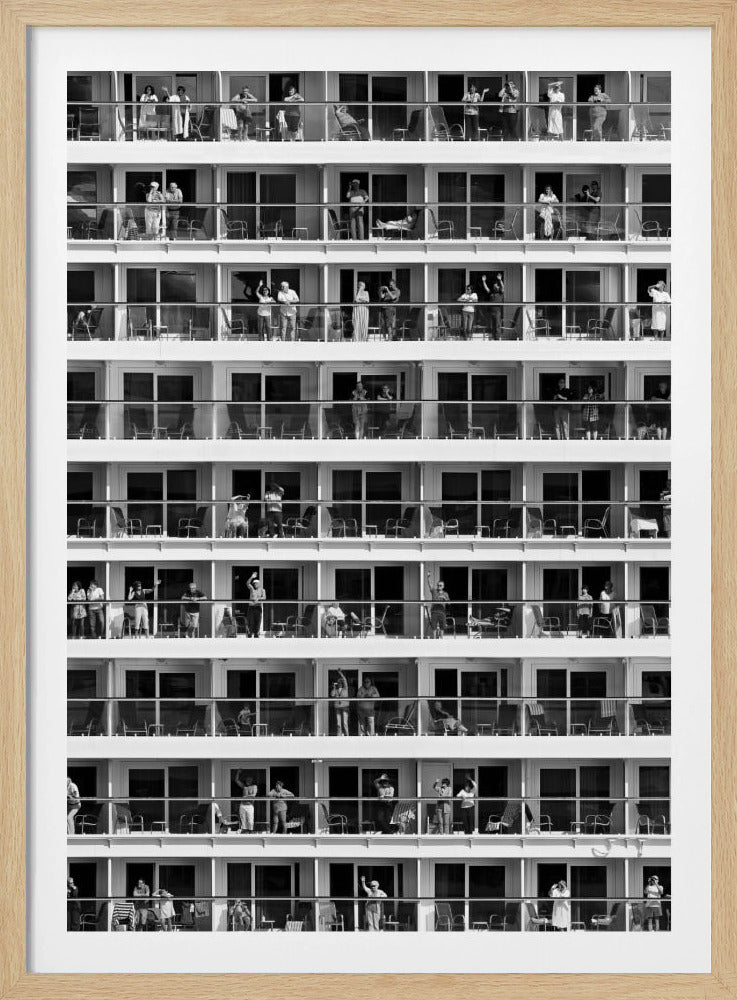 A black and white, high-contrast photograph of the side of a cruise ship, showing a grid of balconies across multiple decks. Various passengers are visible on their balconies, some waving, some relaxing, and some observing, creating a pattern of individual human stories within the repetitive architectural structure. Poster
