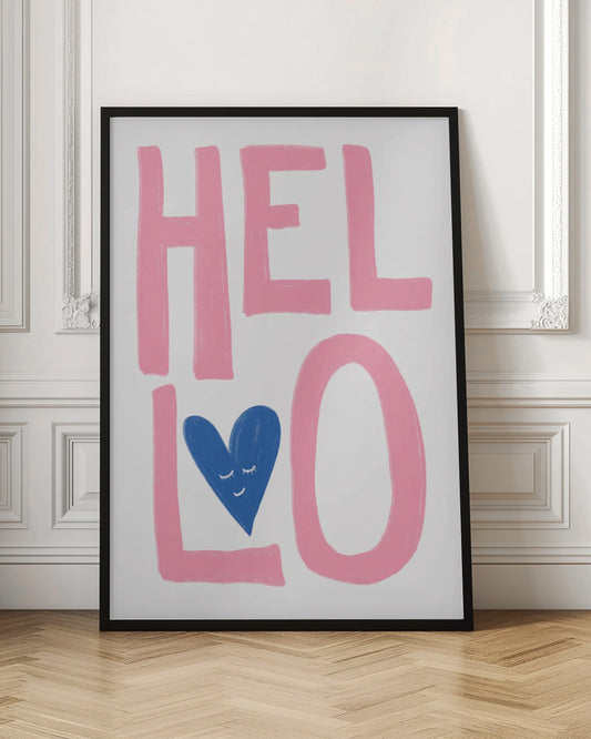A cute typographic art print with the word 'HELLO' in large, hand-drawn pink letters against a white background. The word is split into two lines, 'HEL' and 'LO'. A blue heart with a small, smiling, sleeping face is placed inside the letter 'L'. Poster