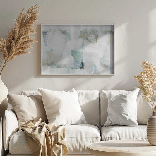 Abstract painting with bold white brushstrokes over a background of soft green, blue, and beige hues in a silver frame.