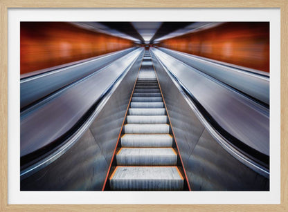 A symmetrical, low-angle photograph looking up a very long escalator, creating a strong sense of perspective towards a vanishing point. The orange walls are motion-blurred, suggesting speed, while the metallic steps in the center remain clear. Decor