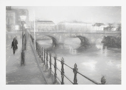 A framed, black and white impressionistic artwork of a city scene on a foggy or rainy day. In the foreground, a dark metal railing runs along a riverside walkway where a person in a dark coat is walking. An arched stone bridge crosses the river in the midground, with hazy buildings visible in the background, creating a moody and atmospheric scene. Wall Art