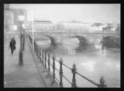 A framed, black and white impressionistic artwork of a city scene on a foggy or rainy day. In the foreground, a dark metal railing runs along a riverside walkway where a person in a dark coat is walking. An arched stone bridge crosses the river in the midground, with hazy buildings visible in the background, creating a moody and atmospheric scene. Wall Art