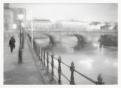 A framed, black and white impressionistic artwork of a city scene on a foggy or rainy day. In the foreground, a dark metal railing runs along a riverside walkway where a person in a dark coat is walking. An arched stone bridge crosses the river in the midground, with hazy buildings visible in the background, creating a moody and atmospheric scene. Wall Art