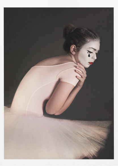 A portrait of a sad ballerina with white mime makeup and a black teardrop painted on her cheek, wearing a pink leotard and white tutu against a dark gray background. Artwork