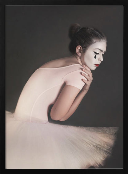 A portrait of a sad ballerina with white mime makeup and a black teardrop painted on her cheek, wearing a pink leotard and white tutu against a dark gray background. Artwork