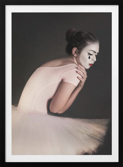 A portrait of a sad ballerina with white mime makeup and a black teardrop painted on her cheek, wearing a pink leotard and white tutu against a dark gray background. Artwork