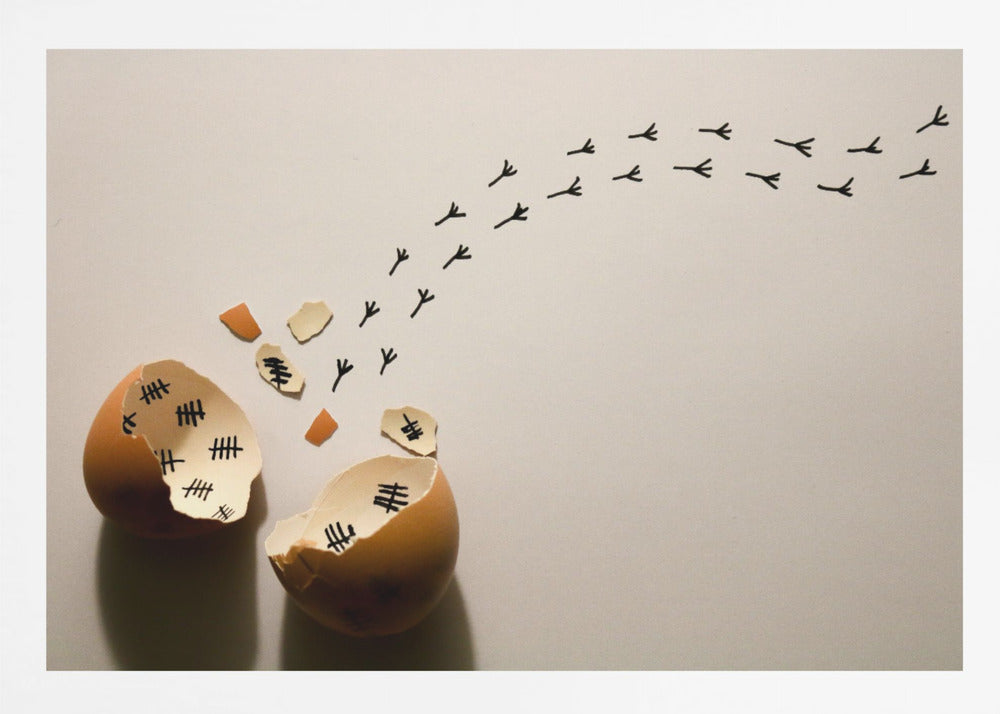 A conceptual art piece showing a broken brown eggshell against a beige background. Inside the shell are black tally marks, as if counting days. A trail of tiny black chicken footprints leads away from the egg, suggesting a chick has finally hatched and escaped after a long wait. Artwork
