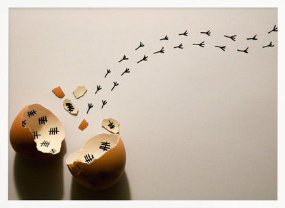 A conceptual art piece showing a broken brown eggshell against a beige background. Inside the shell are black tally marks, as if counting days. A trail of tiny black chicken footprints leads away from the egg, suggesting a chick has finally hatched and escaped after a long wait. Artwork
