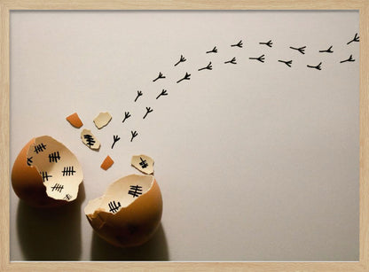 A conceptual art piece showing a broken brown eggshell against a beige background. Inside the shell are black tally marks, as if counting days. A trail of tiny black chicken footprints leads away from the egg, suggesting a chick has finally hatched and escaped after a long wait. Artwork