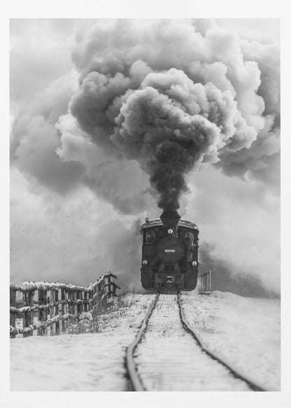 A dramatic black and white photograph of a vintage steam train on tracks in a snowy landscape, viewed from a low angle. A massive, powerful plume of dark smoke billows from the smokestack, filling the sky. Decor