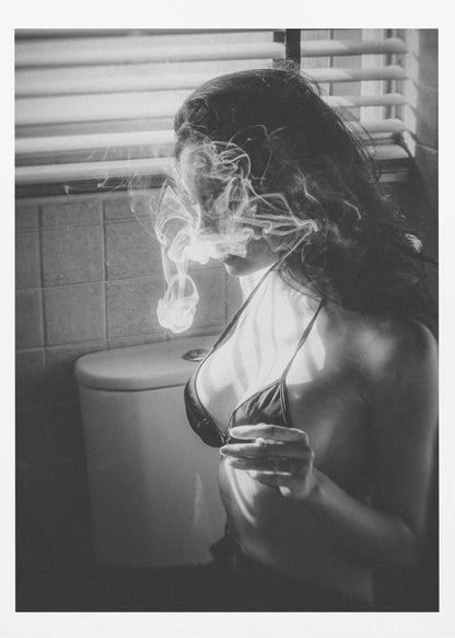 A black and white photograph of a woman in a bikini top smoking a cigarette in a bathroom. Light from a window with blinds creates dramatic shadows as a thick cloud of smoke obscures her face. Poster