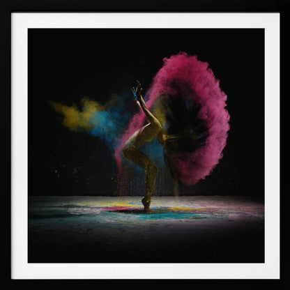 A dynamic photo of a dancer arching backward, their long hair creating a massive arc of vibrant pink powder against a black background, with smaller bursts of blue and yellow. Decor