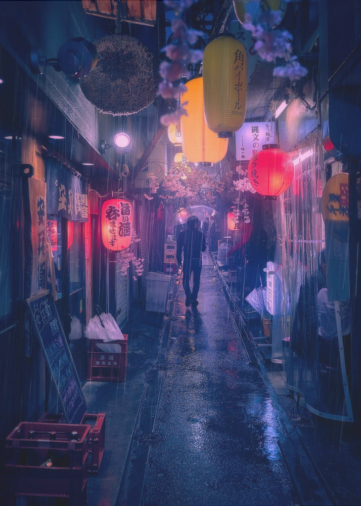 A lone figure walks down a narrow, rain-slicked Japanese alley at night. Colorful paper lanterns hang overhead, casting warm orange and red light that reflects on the wet ground, contrasting with the cool blue tones of the evening. Wall Art