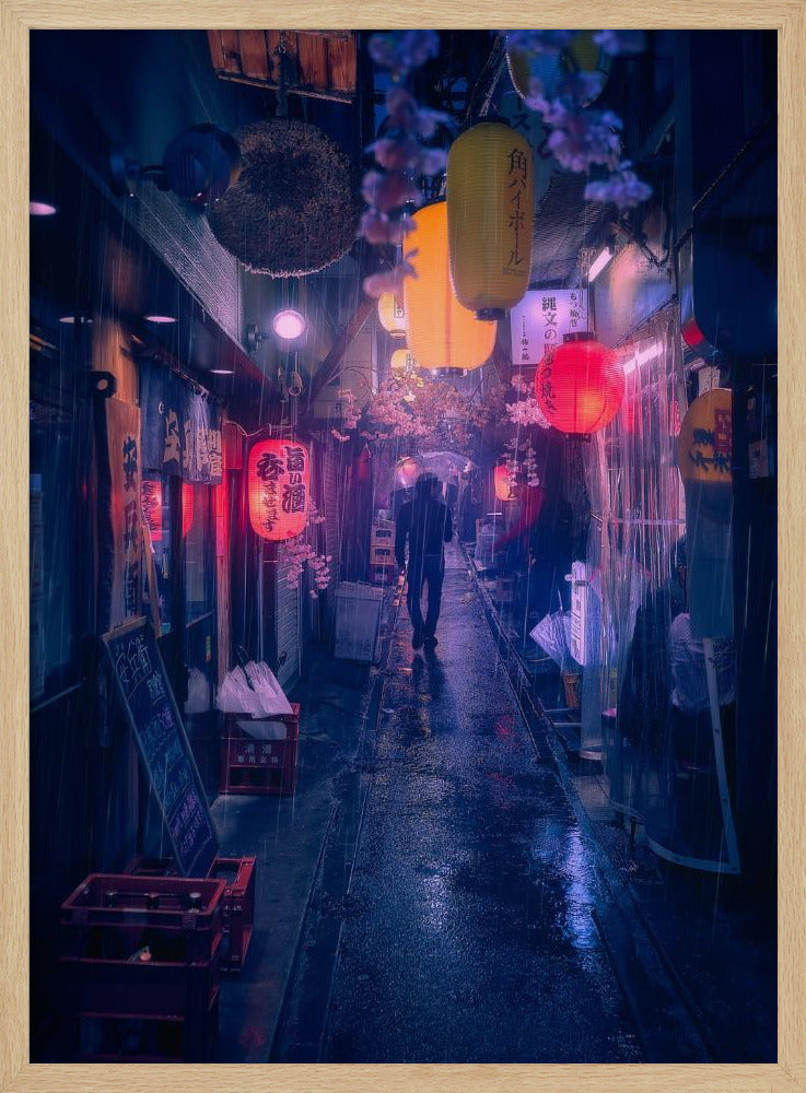 A lone figure walks down a narrow, rain-slicked Japanese alley at night. Colorful paper lanterns hang overhead, casting warm orange and red light that reflects on the wet ground, contrasting with the cool blue tones of the evening. Wall Art