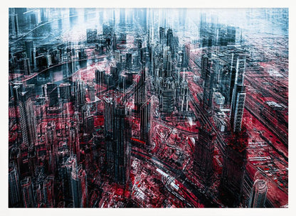 An abstract, digitally manipulated aerial photograph of a dense, futuristic cityscape. The image features towering skyscrapers in cool blue and dark gray tones, while the streets and ground below are saturated in a vibrant, contrasting red. The artwork has a glitchy, multi-exposure effect, creating a sense of dynamic chaos, and is enclosed in a silver frame. Artwork