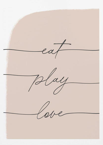 A modern typographic art print in a black frame. The words 'eat', 'play', and 'love' are written in a black cursive script, each on a separate line against a pale pink painted background. Print