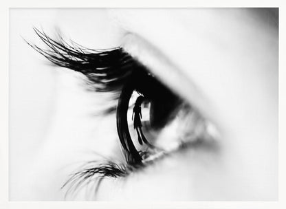 A dramatic black and white macro photograph of a human eye in profile, with a surreal reflection of a person's silhouette visible in the pupil. Print