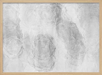 Abstract art with soft, cloud-like shapes in shades of grey and white, set in a silver frame.
