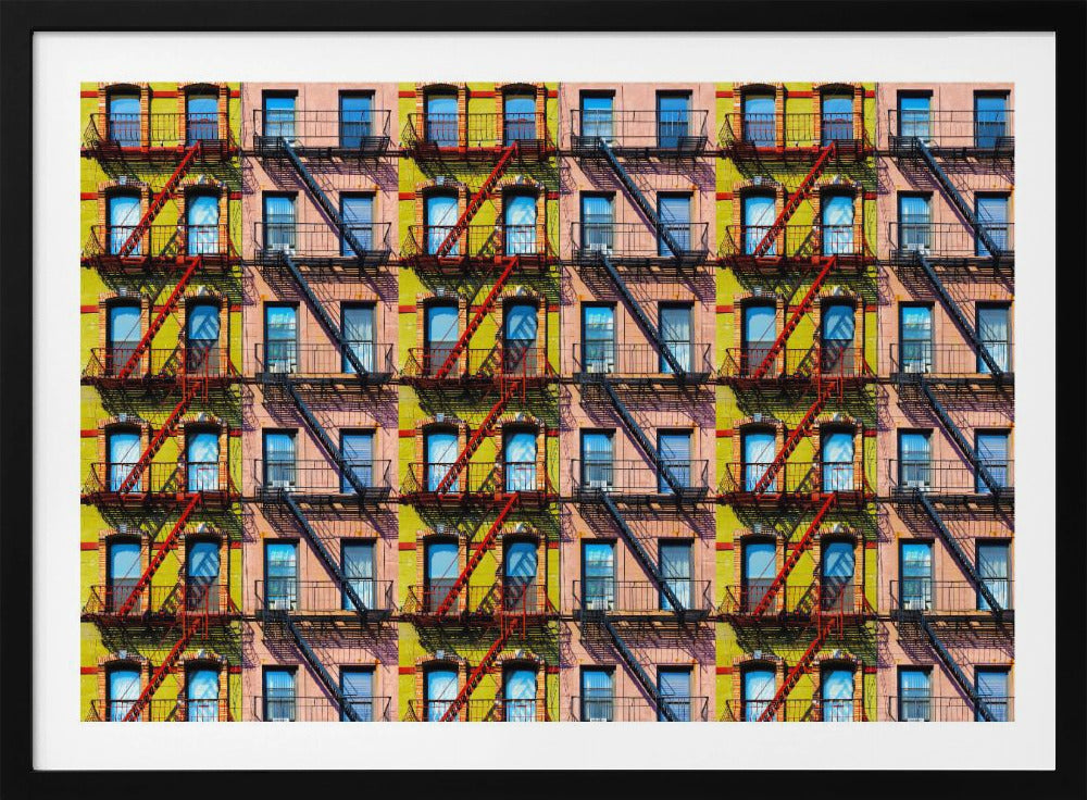 A pop-art style repeating pattern of a colorful apartment building facade featuring pink and yellow walls, windows reflecting a blue sky, and a network of black and red fire escapes, enclosed in a silver frame. Artwork
