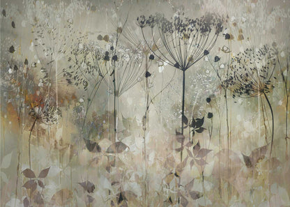 An abstract botanical artwork featuring the delicate black silhouettes of wildflowers, like Queen Anne's lace, against a muted, textured background of beige, sage green, and earthy brown. The composition has a dreamy, layered effect and is displayed in a silver frame. Print