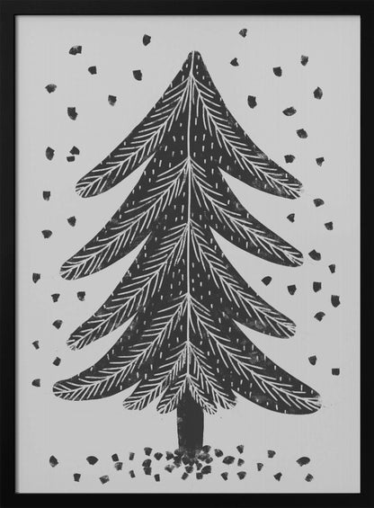 A black and white block print illustration of a stylized Christmas tree against a light gray background. Black specks representing falling snow surround the tree. The artwork has a rustic, folk art feel and is presented in a black frame. Print