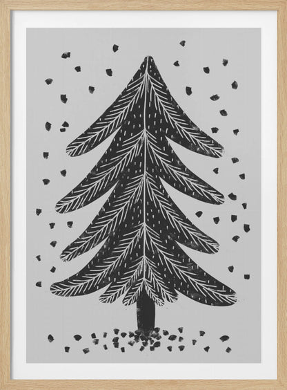 A black and white block print illustration of a stylized Christmas tree against a light gray background. Black specks representing falling snow surround the tree. The artwork has a rustic, folk art feel and is presented in a black frame. Print