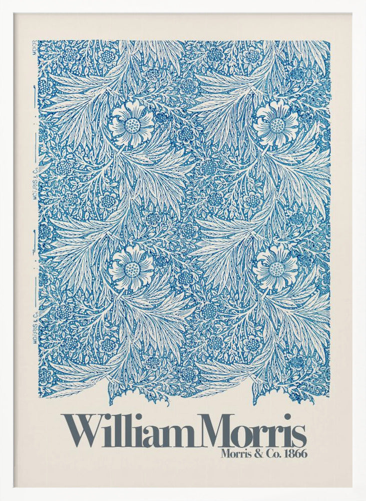 A framed art print of a William Morris design featuring an intricate, repeating floral and foliage pattern in blue on a white background. Below the pattern, the text 'William Morris' and 'Morris & Co. 1866' is printed in grey against a cream-colored border. Artwork