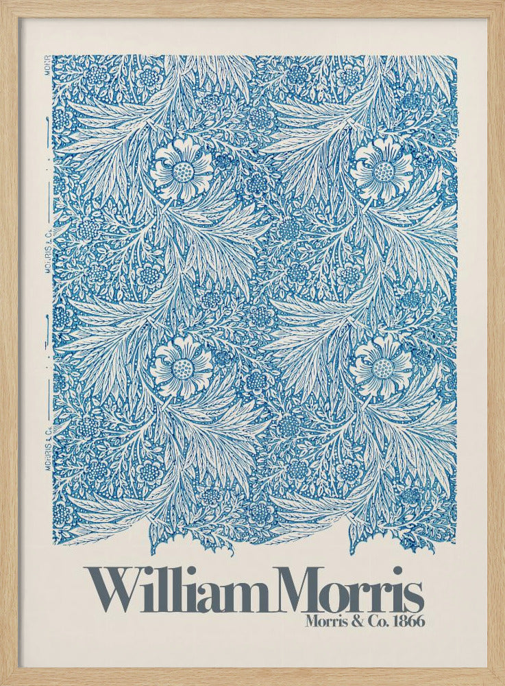 A framed art print of a William Morris design featuring an intricate, repeating floral and foliage pattern in blue on a white background. Below the pattern, the text 'William Morris' and 'Morris & Co. 1866' is printed in grey against a cream-colored border. Artwork