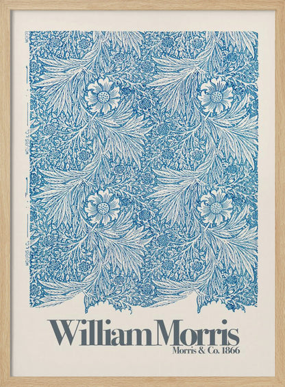 A framed art print of a William Morris design featuring an intricate, repeating floral and foliage pattern in blue on a white background. Below the pattern, the text 'William Morris' and 'Morris & Co. 1866' is printed in grey against a cream-colored border. Artwork