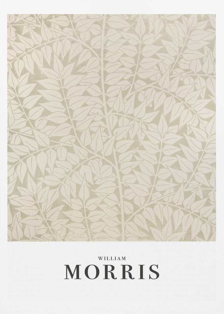 A framed art print by William Morris featuring a dense, repeating pattern of stylized leaves and branches in cream and light sage green. A white border at the bottom displays 'WILLIAM MORRIS' in a black serif font. Artwork