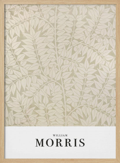 A framed art print by William Morris featuring a dense, repeating pattern of stylized leaves and branches in cream and light sage green. A white border at the bottom displays 'WILLIAM MORRIS' in a black serif font. Artwork