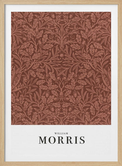 A framed art print of a classic William Morris design. The intricate, symmetrical pattern features terracotta-colored oak leaves, acorns, and stylized flowers on a rich brown background. Below the pattern is a white section with the name 'WILLIAM MORRIS' in black serif font. Print