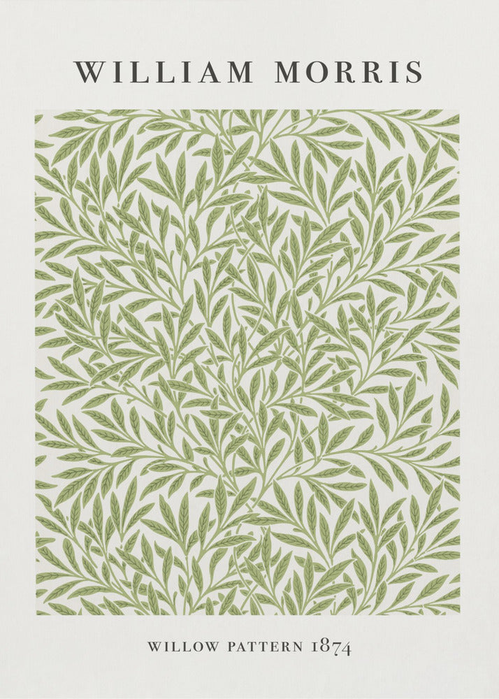 A framed art print of William Morris's 'Willow Pattern 1874'. The print features an intricate, repeating pattern of green willow branches and leaves on an off-white background, with the artist's name and pattern title in black text above and below the design. Print