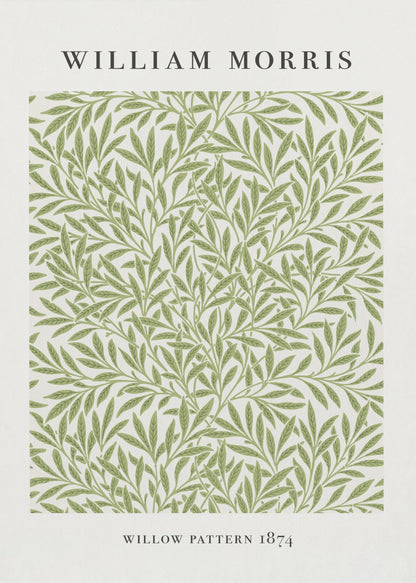 A framed art print of William Morris's 'Willow Pattern 1874'. The print features an intricate, repeating pattern of green willow branches and leaves on an off-white background, with the artist's name and pattern title in black text above and below the design. Print
