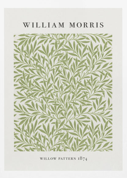 A framed art print of William Morris's 'Willow Pattern 1874'. The print features an intricate, repeating pattern of green willow branches and leaves on an off-white background, with the artist's name and pattern title in black text above and below the design. Print