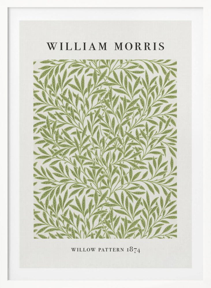 A framed art print of William Morris's 'Willow Pattern 1874'. The print features an intricate, repeating pattern of green willow branches and leaves on an off-white background, with the artist's name and pattern title in black text above and below the design. Print