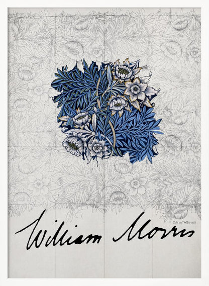 A framed vintage art print by William Morris. The artwork showcases a central colored sample of an intricate blue, white, and gold floral and foliage pattern, laid over a faint grayscale sketch of a similar repeating design. Below, the artist's name 'William Morris' is written in a large, black, cursive script. Print