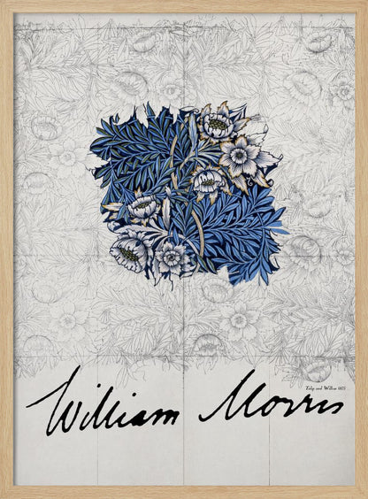 A framed vintage art print by William Morris. The artwork showcases a central colored sample of an intricate blue, white, and gold floral and foliage pattern, laid over a faint grayscale sketch of a similar repeating design. Below, the artist's name 'William Morris' is written in a large, black, cursive script. Print