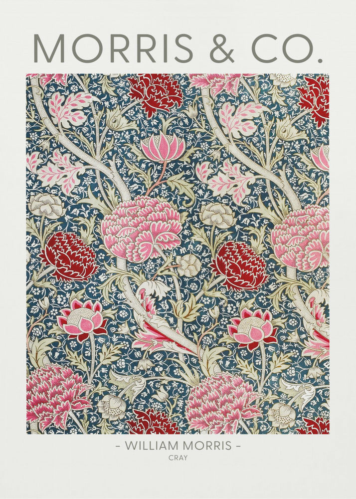 A framed art print of William Morris's 'Cray' pattern, featuring a dense floral design with large pink and red stylized flowers and foliage on a dark navy blue background. The text 'MORRIS & CO.' is above the pattern, and '- WILLIAM MORRIS - CRAY' is below. Artwork