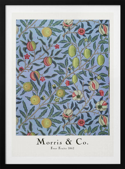 A framed art print of the 'Four Fruits 1862' pattern by Morris & Co. The intricate botanical design features various fruits like lemons, pomegranates, and oranges, along with red and yellow flowers, all intertwined on branches with dark green leaves against a light blue background. Poster