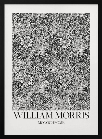 A framed art print featuring a classic William Morris pattern in monochrome. The intricate black and white design is filled with dense, swirling foliage and stylized flowers. The artwork has a white border, and at the bottom, the text 'WILLIAM MORRIS' is displayed prominently, with 'MONOCHROME' written underneath in a smaller font. Artwork