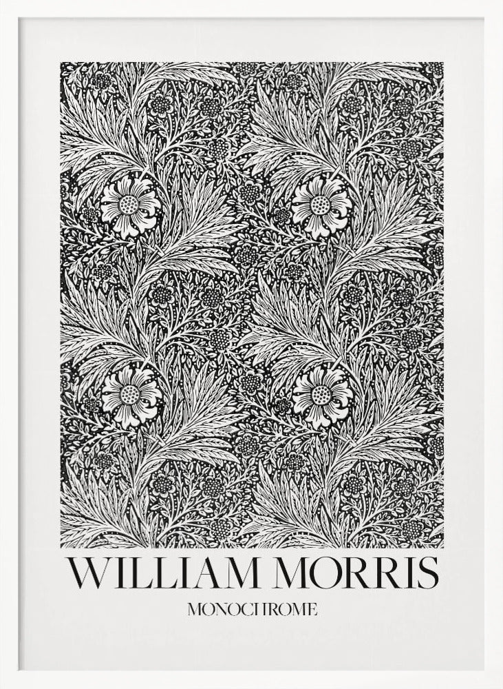A framed art print featuring a classic William Morris pattern in monochrome. The intricate black and white design is filled with dense, swirling foliage and stylized flowers. The artwork has a white border, and at the bottom, the text 'WILLIAM MORRIS' is displayed prominently, with 'MONOCHROME' written underneath in a smaller font. Artwork